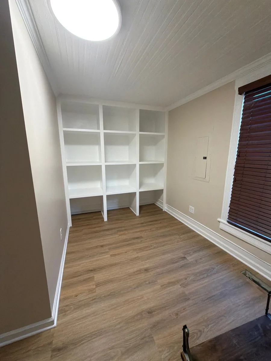 Renovated interior with built-in shelving